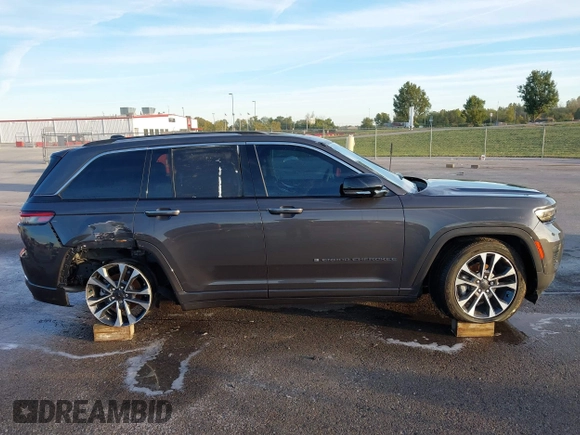 2023 Jeep Grand Cherokee Overland with VIN 1C4RJHDGXP8864365, listed as a IAAI auction lot 40502141 with 3,911 mi miles and . Bid and sale history available at DreamBid. Image 13.