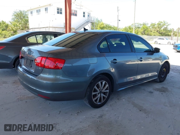 2012 Volkswagen Jetta Sedan SE w/Convenience with VIN 3VWDX7AJ6CM407834, listed as a IAAI auction lot 42013215 with 168,035 mi miles. Bid and sale history available at carsss.com. Image 4.