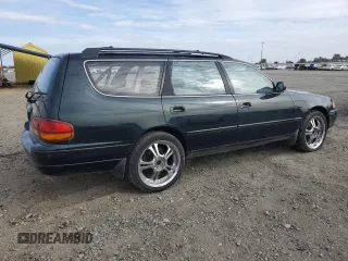 1995 Toyota Camry LE z VIN 4T1GK12W4SU079938, wystawiony jako Copart lot #77065084 z przebiegiem 222 731 mil mil oraz Szkoda całkowita • Salvage title. Historia ofert i sprzedaży dostępna na DreamBid. Obrazek 3.