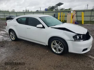 2014 Dodge Avenger SXT with VIN 1C3CDZCG3EN165716, listed as a Copart auction lot 57795365 with 33,070 mi miles and Salvage title. Bid and sale history available at DreamBid. Image 4.