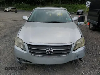 2007 Toyota Avalon XL z VIN 4T1BK36B97U209376, wystawiony jako Copart lot #60779405 z przebiegiem 189 776 mil mil oraz Czysty tytuł • Clean title. Historia ofert i sprzedaży dostępna na DreamBid. Obrazek 5.