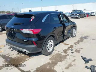 2020 Ford Escape SE with VIN 1FMCU0G61LUB77189, listed as a IAAI auction lot 41688121 with 101,407 mi miles and . Bid and sale history available at DreamBid. Image 4.