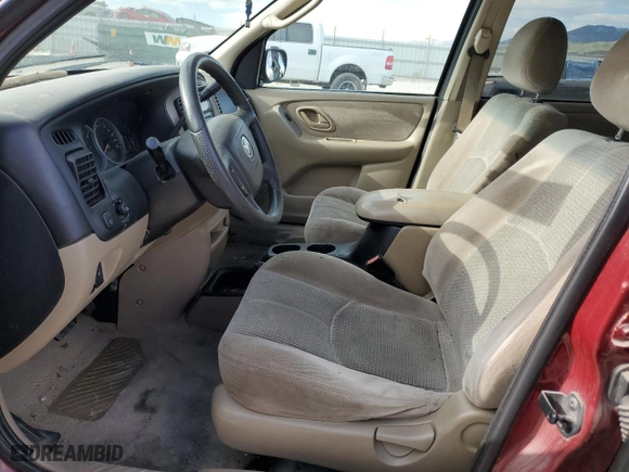 2004 Mazda Tribute LX with VIN 4F2YZ94184KM33916, listed as a Copart auction lot 70839734 with 0 mi miles and Salvage Title. Bid and sale history available at carsss.com. Image 7.