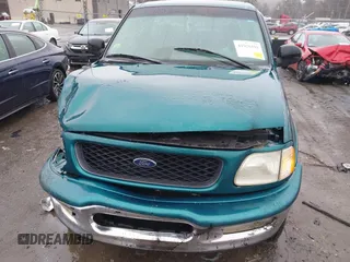1998 Ford F-150 with VIN 1FTZF08W9WKC01424, listed as a IAAI auction lot 41926191 with 191,424 mi miles and . Bid and sale history available at DreamBid. Image 12.
