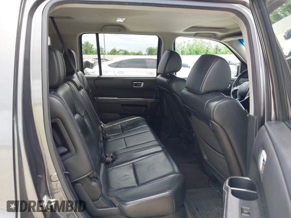 2013 Honda Pilot EX-L with VIN 5FNYF3H51DB002883, listed as a IAAI auction lot 42145649 with 223,901 mi miles. Bid and sale history available at carsss.com. Image 8.