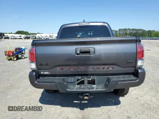 2022 Toyota Tacoma SR z VIN 3TYCZ5AN8NT076536, wystawiony jako Copart lot #55268985 z przebiegiem 57 697 mil mil oraz Szkoda całkowita • Salvage title. Historia ofert i sprzedaży dostępna na DreamBid. Obrazek 6.