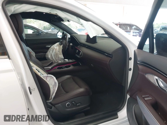 2022 Genesis GV70 2.5T with VIN KMUMADTBXNU045298, listed as a IAAI auction lot 42515480 with 82,599 mi miles and . Bid and sale history available at DreamBid. Image 5.