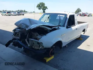 2009 Ford Ranger XL with VIN 1FTYR10D19PA26421, listed as a IAAI auction lot 42140982 with 121,689 mi miles. Bid and sale history available at carsss.com. Image 2.