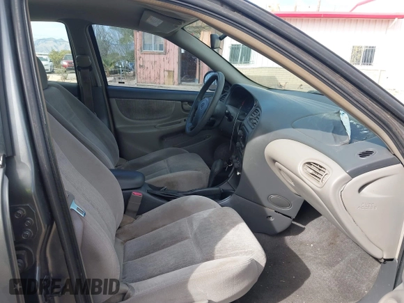 2004 Oldsmobile Alero GL1 z VIN 1G3NL52F84C124744, wystawiony jako IAAI lot #41916407 z przebiegiem 164 660 mil mil oraz . Historia ofert i sprzedaży dostępna na DreamBid. Obrazek 5.