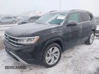 2021 Volkswagen Atlas SE with VIN 1V2HR2CA9MC574558, listed as a IAAI auction lot 41296583 with 50,267 mi miles and . Bid and sale history available at DreamBid. Image 2.