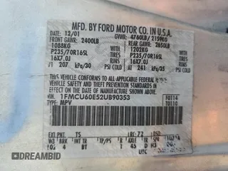 2002 Ford Explorer with VIN 1FMCU60E52UB90353, listed as a Copart auction lot 75659554 with 212,592 mi miles and Salvage title. Bid and sale history available at DreamBid. Image 12.