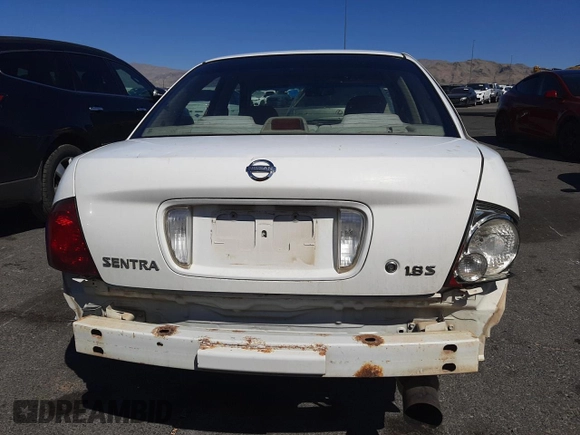 2004 Nissan Sentra S z VIN 3N1CB51D04L915688, wystawiony jako Copart lot #53837195 z przebiegiem 210 578 mil mil oraz Szkoda całkowita • Salvage title. Historia ofert i sprzedaży dostępna na DreamBid. Obrazek 6.