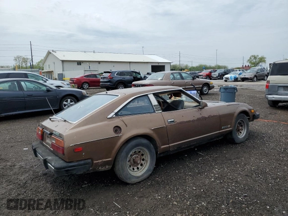1979 Datsun 280ZX z VIN HGS130115983, wystawiony jako Copart lot #54709755 z przebiegiem 74 026 mil mil oraz Tytuł czysty. Historia ofert i sprzedaży dostępna na DreamBid. Obrazek 3.