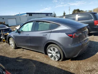 2023 Tesla Model Y Long Range with VIN LRWYGDEE4PC137054, listed as a Copart auction lot 48340895 with 0 mi miles and Non Repairable. Bid and sale history available at carsss.com. Image 2.