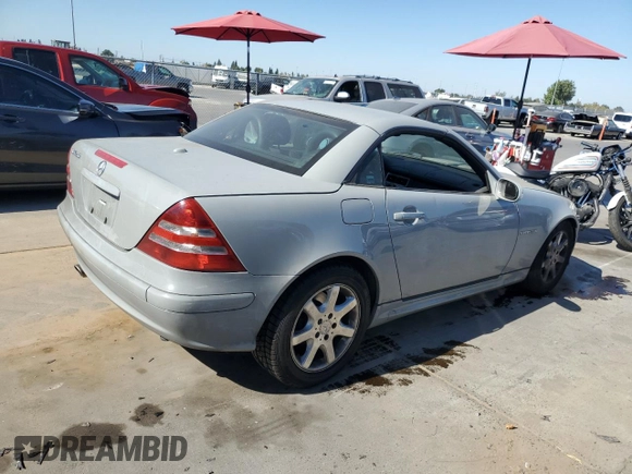 2001 Mercedes-Benz SLK 230 Kompressor with VIN WDBKK49F61F187940, listed as a Copart auction lot 76110434 with 95,053 mi miles and Clean Title. Bid and sale history available at DreamBid. Image 3.