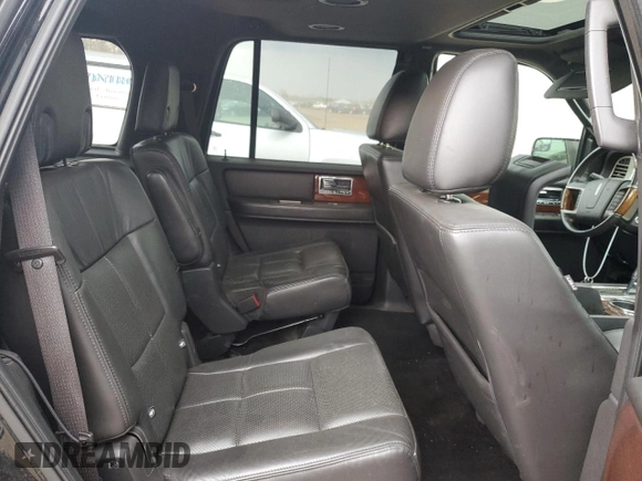 2014 Lincoln Navigator z VIN 5LMJJ2J57EEL02363, wystawiony jako Copart lot #54657415 z przebiegiem 245 326 mil mil oraz Czysty tytuł • Clean title. Historia ofert i sprzedaży dostępna na DreamBid. Obrazek 11.