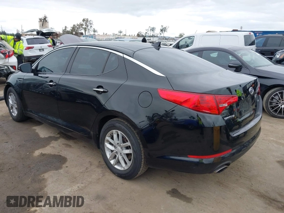2012 Kia Optima LX with VIN KNAGM4A72C5291451, listed as a IAAI auction lot 42068559 with 121,548 mi miles and . Bid and sale history available at carsss.com. Image 3.