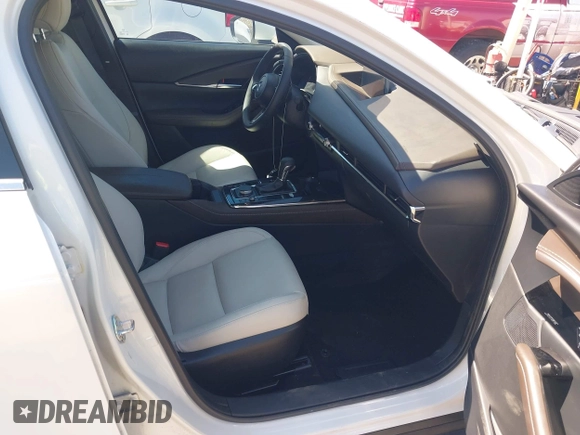2024 Mazda CX-30 S Premium with VIN 3MVDMBDM8RM633580, listed as a IAAI auction lot 42152915 with 18,679 mi miles and . Bid and sale history available at DreamBid. Image 5.