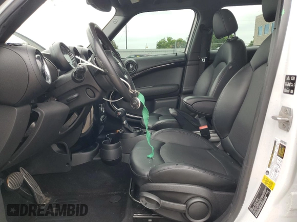 2015 MINI Countryman S with VIN WMWZC5C58FWP46931, listed as a Copart auction lot 59183495 with 105,731 mi miles and Salvage title. Bid and sale history available at DreamBid. Image 7.