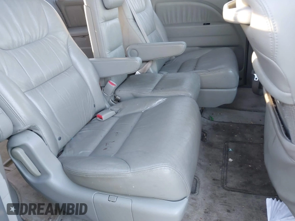 2007 Honda Odyssey EX-L z VIN 5FNRL387X7B081408, wystawiony jako IAAI lot #41143045 z przebiegiem 201 248 mil mil oraz . Historia ofert i sprzedaży dostępna na DreamBid. Obrazek 8.
