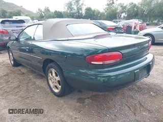 1998 Chrysler Sebring JXi with VIN 3C3EL55H6WT232076, listed as a IAAI auction lot 41906230 with 54,718 mi miles and . Bid and sale history available at DreamBid. Image 3.