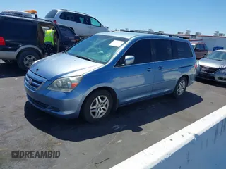 2006 Honda Odyssey EX with VIN 5FNRL38466B065601, listed as a IAAI auction lot 42559342 with 258,995 mi miles and . Bid and sale history available at DreamBid. Image 2.