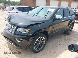 2017 Jeep Grand Cherokee Overland z VIN 1C4RJFCG4HC662884, wystawiony jako IAAI lot #42172826 z przebiegiem 79 305 mil mil oraz . Historia ofert i sprzedaży dostępna na DreamBid. Obrazek 2.