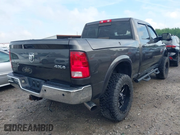 2017 Ram 2500 SLT with VIN 3C6UR5DL9HG561899, listed as a IAAI auction lot 42071797 with 134,808 mi miles and . Bid and sale history available at DreamBid. Image 4.