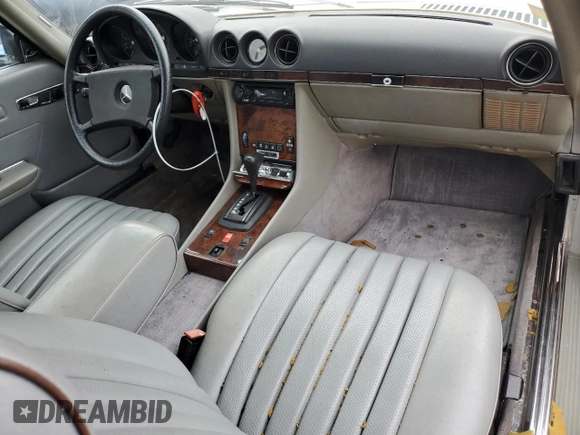 1985 Mercedes-Benz SL with VIN WDBBA45C6FA024529, listed as a Copart auction lot 73559924 with 75,789 mi miles and Salvage title. Bid and sale history available at DreamBid. Image 8.