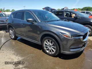 2020 Mazda CX-5 Grand Touring with VIN JM3KFBDM4L0771394, listed as a Copart auction lot 58830274 with 46,534 mi miles and Salvage Title. Bid and sale history available at carsss.com. Image 4.