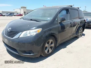 2015 Toyota Sienna LE AAS with VIN 5TDKK3DC7FS687525, listed as a IAAI auction lot 42250458 with 140,429 mi miles and . Bid and sale history available at DreamBid. Image 2.