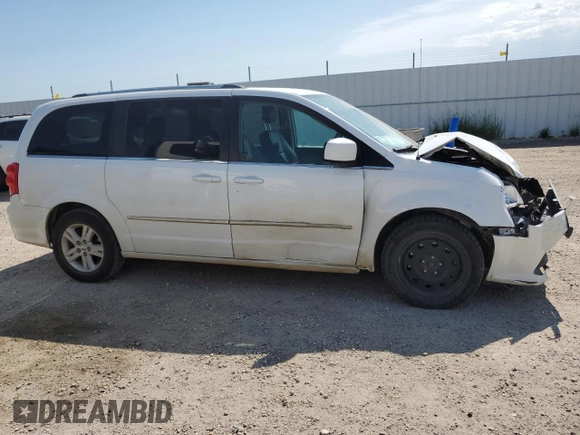 2017 Dodge Grand Caravan Crew Plus with VIN 2C4RDGDG6HR765484, listed as a Copart auction lot 63389874 with 169,529 mi miles and Salvage Title. Bid and sale history available at DreamBid. Image 4.