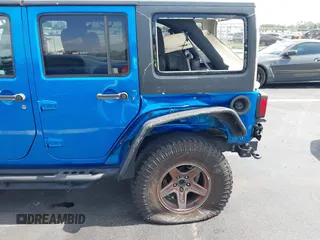 2015 Jeep Wrangler Unlimited Sport with VIN 1C4BJWDG1FL716400, listed as a IAAI auction lot 42645745 with 83,199 mi miles and . Bid and sale history available at DreamBid. Image 6.