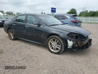 2014 Chevrolet Impala LTZ with VIN 2G1WC5E3XE1185115, listed as a Copart auction lot 60690785 with 119,947 mi miles and Salvage title. Bid and sale history available at DreamBid. Image 4.