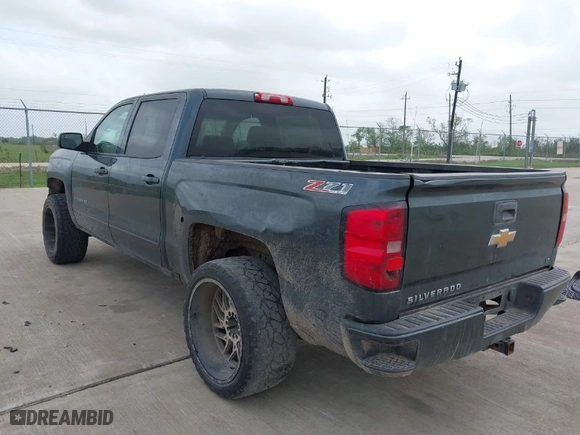 2017 Chevrolet Silverado 1500 LT with VIN 3GCUKREC1HG253015, listed as a IAAI auction lot 41951961 with 148,239 mi miles. Bid and sale history available at carsss.com. Image 3.