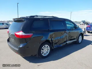 2016 Toyota Sienna XLE with VIN 5TDYK3DC3GS700511, listed as a IAAI auction lot 41814336 with 75,864 mi miles. Bid and sale history available at carsss.com. Image 4.