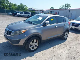 2012 Kia Sportage LX with VIN KNDPBCA28C7237079, listed as a IAAI auction lot 42663554 with 245,420 mi miles and . Bid and sale history available at DreamBid. Image 6.