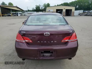 2006 Toyota Avalon XL z VIN 4T1BK36B36U084230, wystawiony jako Copart lot #59911975 z przebiegiem 134 984 mil mil oraz Szkoda całkowita • Salvage title. Historia ofert i sprzedaży dostępna na DreamBid. Obrazek 6.