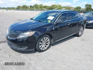 2014 Lincoln MKS with VIN 1LNHL9EK0EG608300, listed as a IAAI auction lot 41900902 with 144,253 mi miles. Bid and sale history available at carsss.com. Image 2.