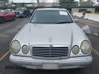 1997 Mercedes-Benz E-Class with VIN WDBJF55FXVJ033553, listed as a IAAI auction lot 41425117 with 280,019 mi miles. Bid and sale history available at carsss.com. Image 11.