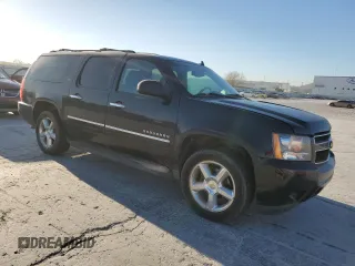 2012 Chevrolet Suburban LTZ with VIN 1GNSKKE71CR310010, listed as a Copart auction lot 48943445 with 311,512 mi miles and Clean title. Bid and sale history available at DreamBid. Image 4.