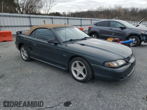 1998 Ford Mustang GT with VIN 1FAFP45XXWF160692, listed as a Copart auction lot 47210885 with 180,035 mi miles and Salvage Title. Bid and sale history available at carsss.com. Image 4.