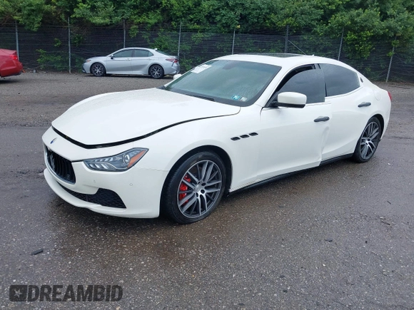 2014 Maserati Ghibli S Q4 z VIN ZAM57RTA9E1077084, wystawiony jako IAAI lot #42283638 z przebiegiem Nie podano mil oraz . Historia ofert i sprzedaży dostępna na DreamBid. Obrazek 2.