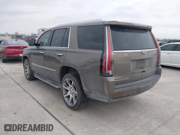 2015 Cadillac Escalade Luxury z VIN 1GYS3MKJ9FR725818, wystawiony jako IAAI lot #41596731 z przebiegiem 224 246 mil mil oraz . Historia ofert i sprzedaży dostępna na DreamBid. Obrazek 3.