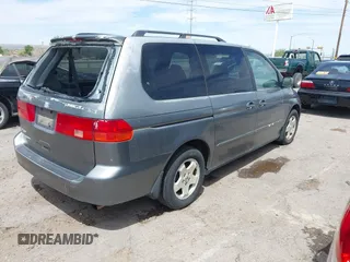 2000 Honda Odyssey EX with VIN 2HKRL1864YH605537, listed as a IAAI auction lot 41972983 with 203,500 mi miles and . Bid and sale history available at DreamBid. Image 4.