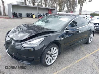 2018 Tesla Model 3 Long Range Battery with VIN 5YJ3E1EA9JF009384, listed as a IAAI auction lot 41544624 with 66,896 mi miles and . Bid and sale history available at DreamBid. Image 19.