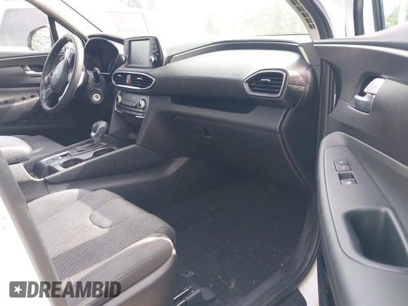 2020 Hyundai Santa Fe SE with VIN 5NMS23AD1LH192085, listed as a IAAI auction lot 42455451 with 50,517 mi miles and . Bid and sale history available at DreamBid. Image 5.