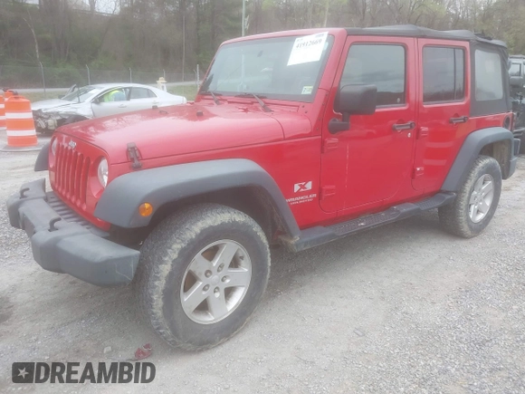 2008 Jeep Wrangler Unlimited X with VIN 1J8GA39128L562347, listed as a IAAI auction lot 41912669 with 106,040 mi miles and . Bid and sale history available at carsss.com. Image 2.