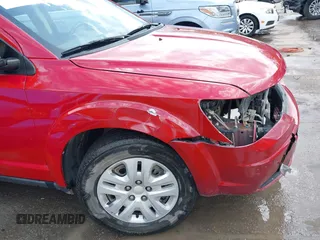 2013 Dodge Journey SE z VIN 3C4PDCAB4DT684886, wystawiony jako IAAI lot #42096367 z przebiegiem 177 338 mil mil oraz . Historia ofert i sprzedaży dostępna na DreamBid. Obrazek 19.