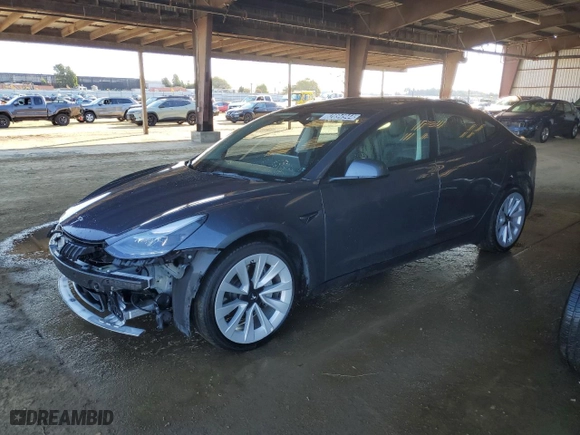 2022 Tesla Model 3 with VIN 5YJ3E1EA5NF290086, listed as a Copart auction lot 82894944 with 80,402 mi miles and Clean Title. Bid and sale history available at carsss.com. Image 1.